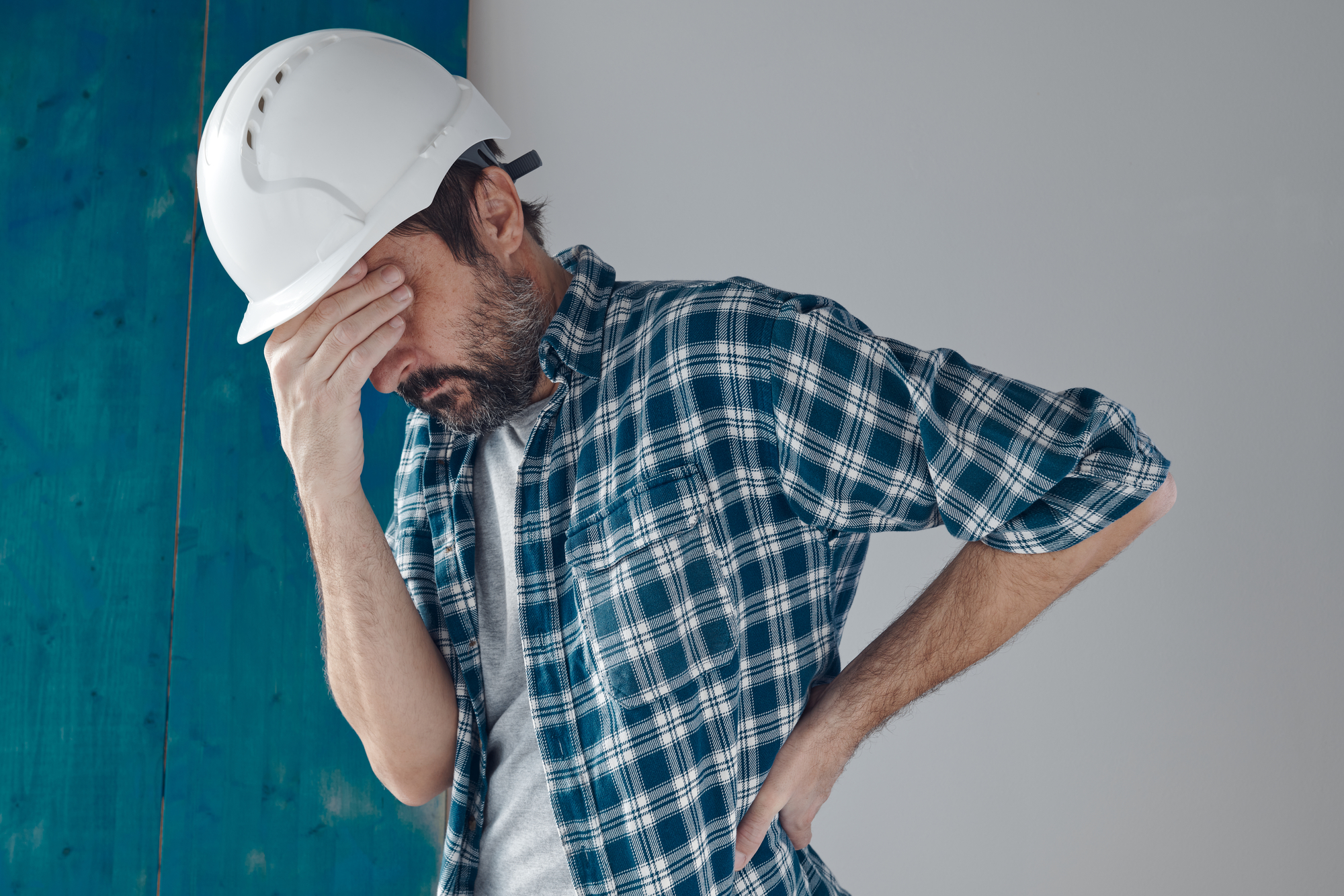 Construction worker feeling overwhelmed - Florida Payment Dispute Attorneys - Bennet Legal Group: Construction & Business Litigation